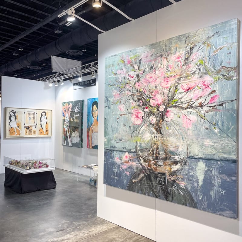 Paintings displayed at Carousel Fine Art's booth at the Palm Beach Show art fair, 2023.