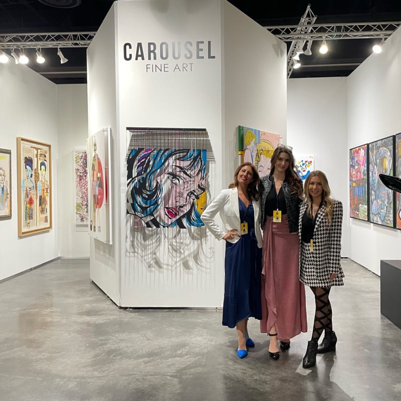 People at Carousel Fine Art's booth at Art Palm Beach, art fair 2023.