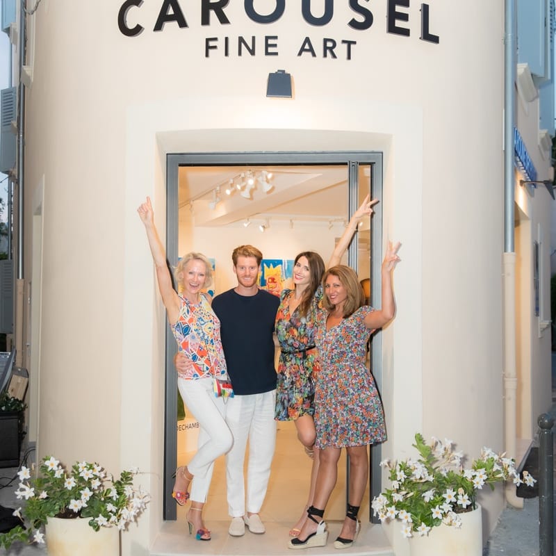 Carousel Fine Art owners posing outside of Carousel Fine Art's gallery space in Saint Tropez.