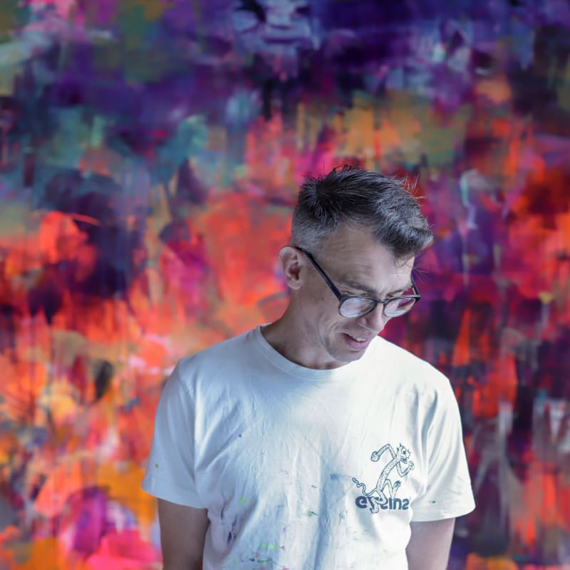 Mr Jago painting a two storey mural in Shoreditch, 2018