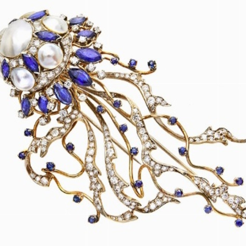 BROOCH, ENRICO SERAFINI, FLORENCE, SIXTIES MATERIAL: yellow, white, diamonds, sapphires and pearls Mabe DESCRIPTION: brooch designed as a jellyfish, with...