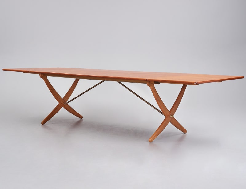 Hans Wegner AT-314 Sabre table , 1950's Teak and oak, brass details H 71.5 cm, total length with the flaps 310 cm, W 105.5 cm.