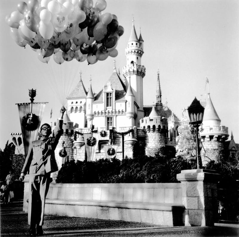 Tseng Kwong Chi Disneyland, California (Castle and Balloons), 1979 Silver gelatin print 91.44 x 91.44 cm; (36 x 36 in.) Edition of 9