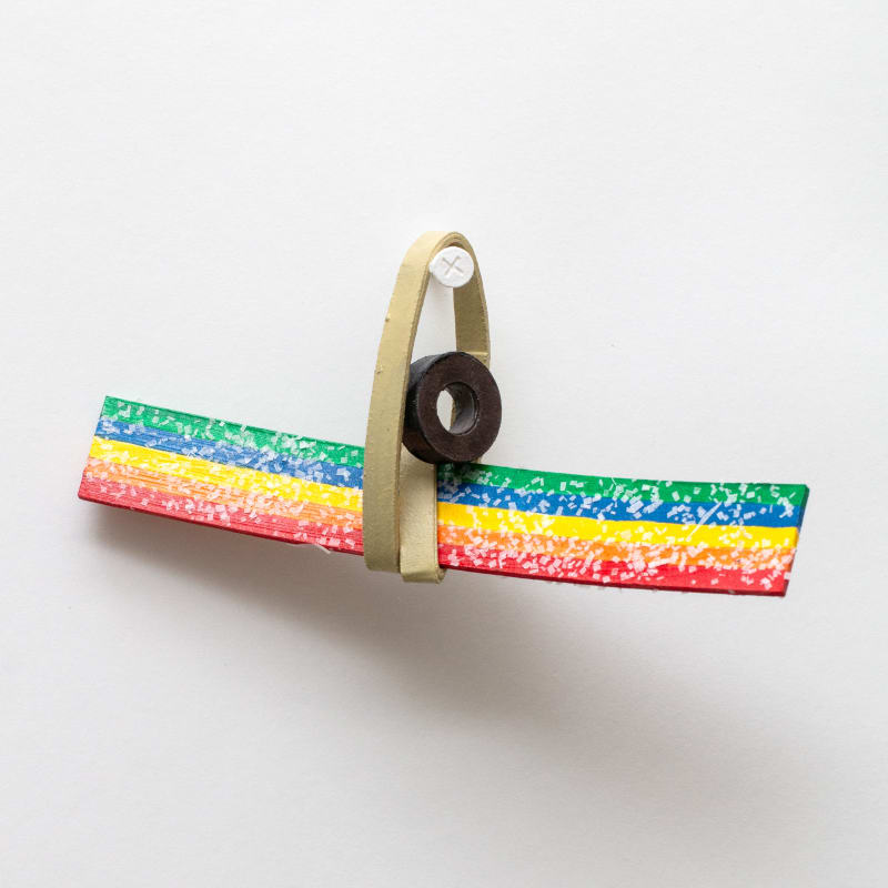 Imin Yeh Airhead extreme, olive, and rubber band, 2024 Acrylic paint, PVA glue, paper, tracing paper. 5 x 2 1/4 x 2 inches