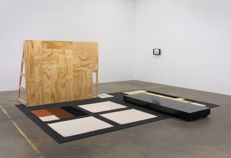 Andrea Zittel Flat Field Work #1, 2015 Fir plywood, acx plywood, tung oil, black enamel paint, 4 hand woven wool textiles, 3 canvas tarps, 20 plywood panels painted with enamel paint, commercial carpet, found wool blanket, watercolor on paper