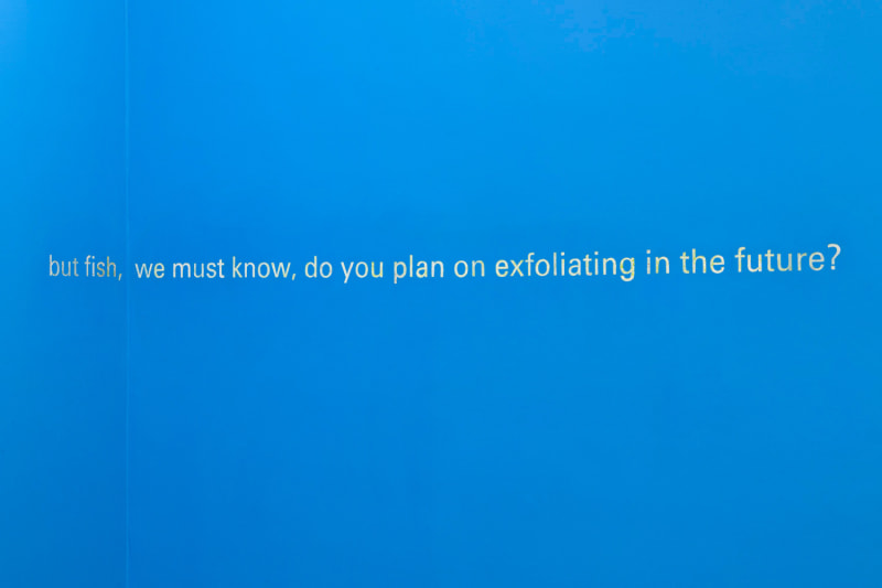 Kameelah Janan Rasheed an accretion made a mistake (but fish, we must know), 2018 Blue paint, drywall installation dimensions variable with text dimensions 4 x 122 inches (10 x 310 cm)