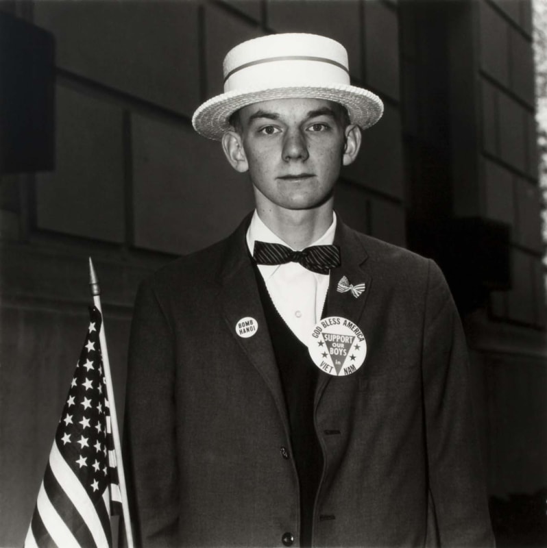 Diane Arbus, Boy with a Straw Hat Waiting to March in a Pro-War Parade, NYC, 1967