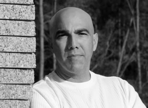 Artist Joe Segal outside his studio