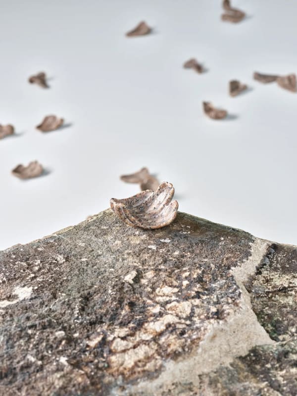 Bethany Collins’s Love is dangerous at MOCA. Pink granite from the base of a Stonewall Jackson monument has been transformed into petals of a Carolina rose. Photo by Awol Erizku for The New York Times