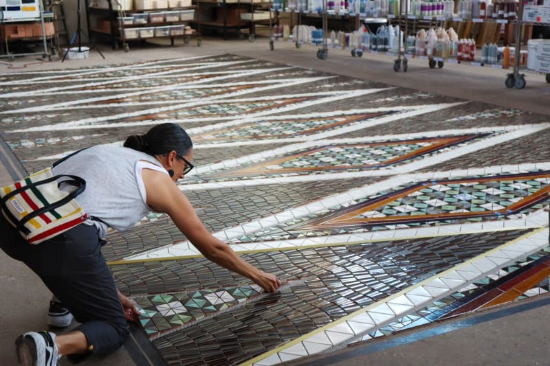 Dyani White Hawk working on her mosaic for the Whitney Museum café. Courtesy the Whitney Museum of American Art