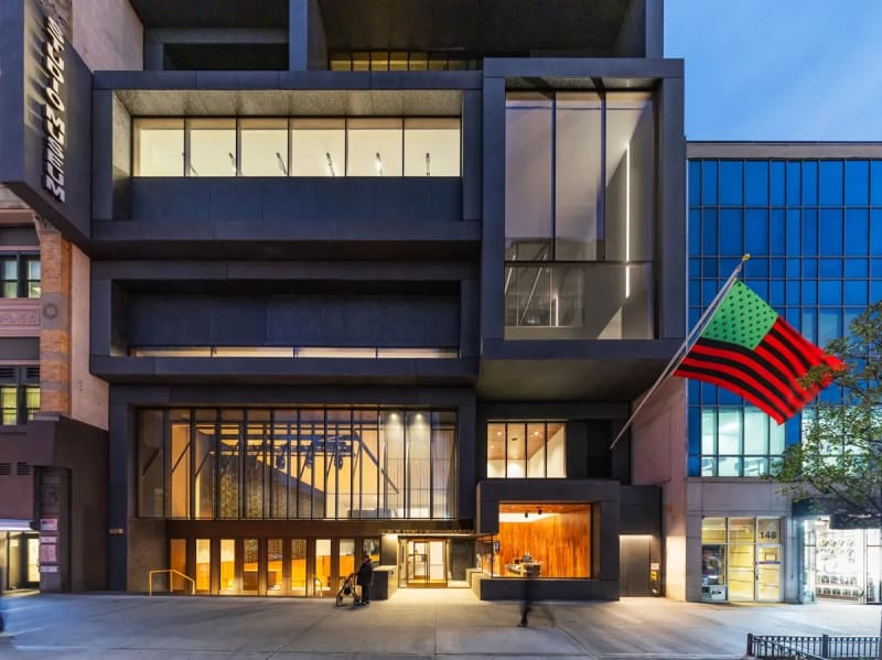Exterior view of the Studio Museum in Harlem's new building, featuring David Hammons's Untitled flag (2004). Photo Albert Vecerka, Esto/Courtesy Studio Museum in Harlem