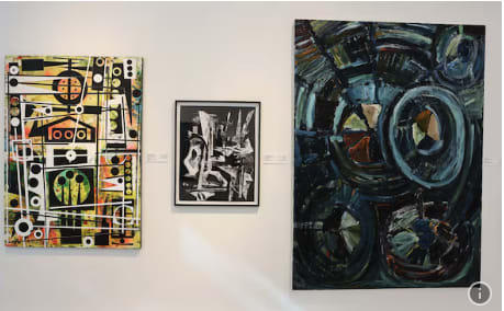 From left: two paintings by Khalid Al Banna and "Sand Dollar No 16" by Hassan Sharif. Pawan Singh / The National