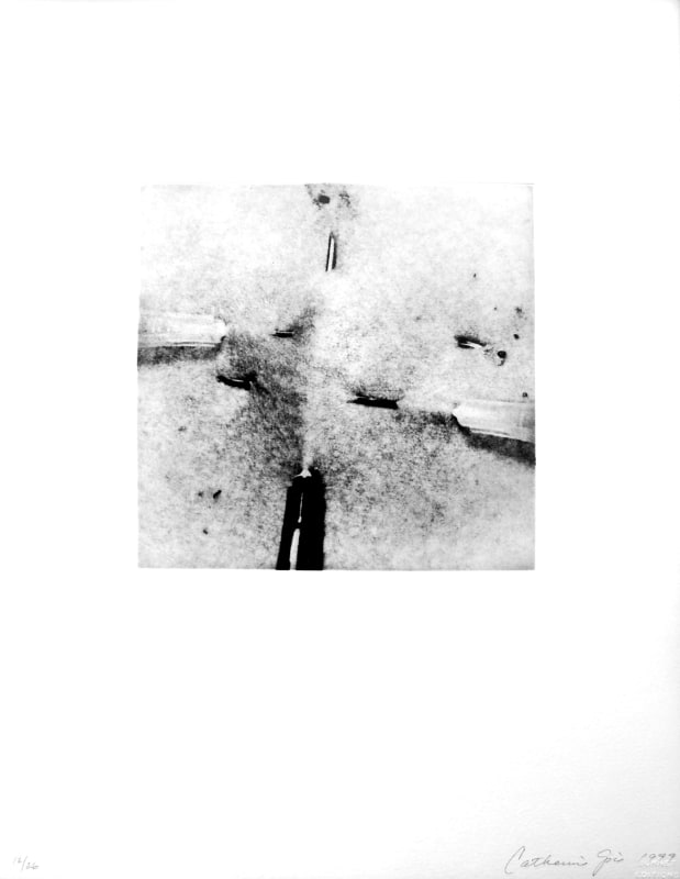 Close-up black and white photograph of needles inserted into a person in a cross shape