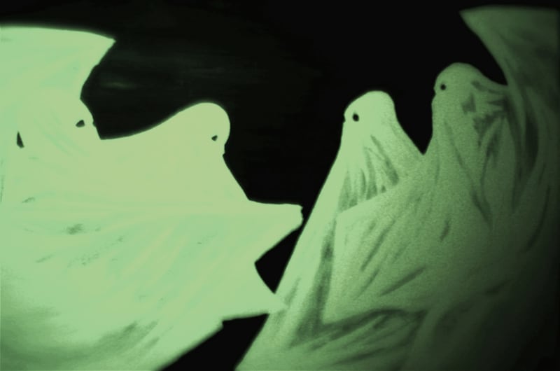 Image of 4 ghosts printed using glow in the dark ink