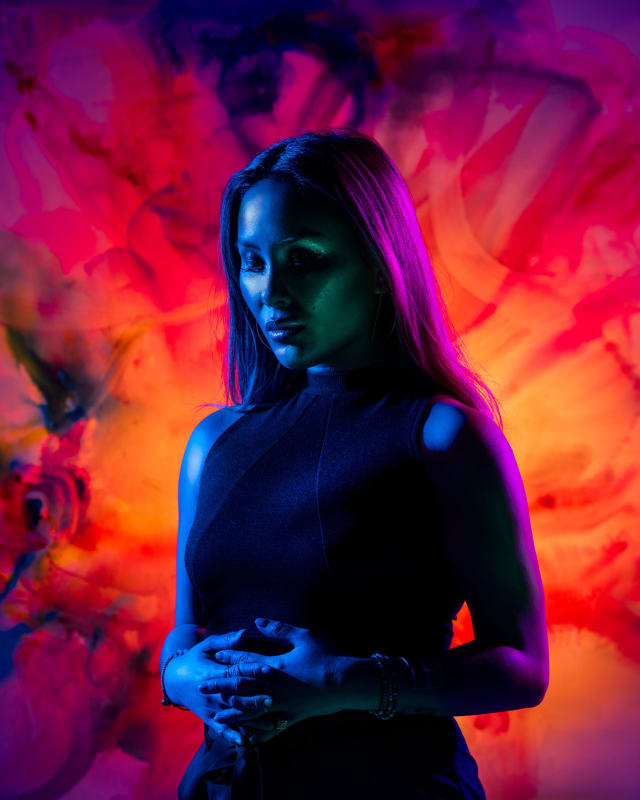 Hueman Portrait with blue and purple lighting.
