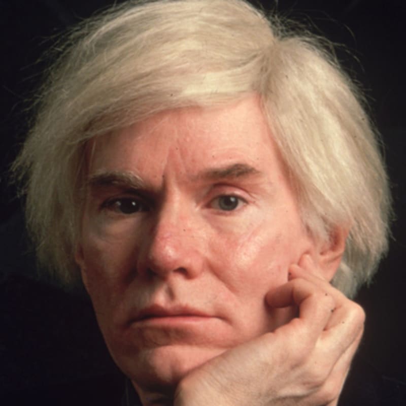 Headshot of Andy Warhol.