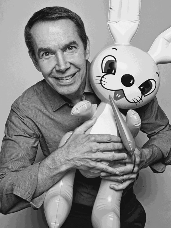 Jeff Koons black and white headshot.