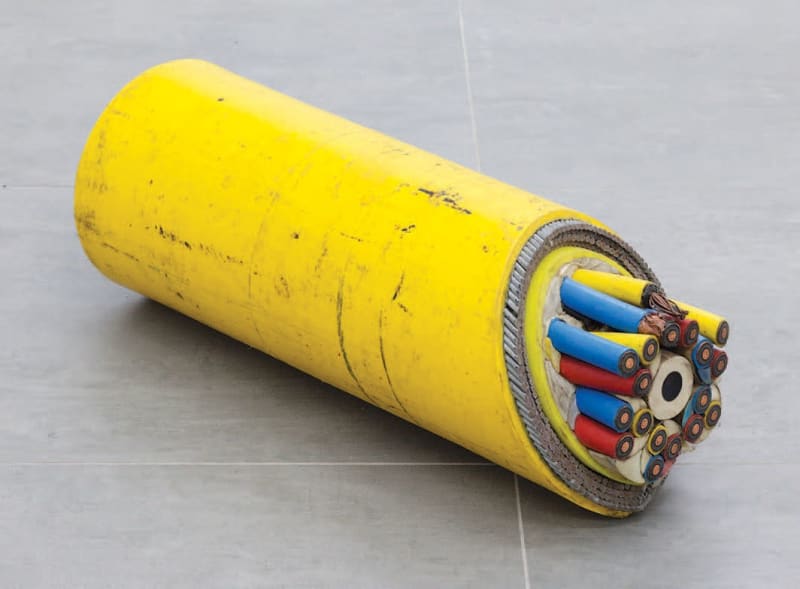 Nina Canell, Brief Syllable (Truncated), 2017, subterranean cable fragment, 9 × 25 5⁄8 × 9". From “Transmissions.”