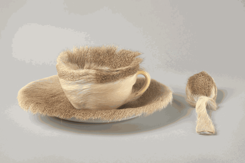 Meret Oppenheim. Object. 1936. Fur-covered cup, saucer, and spoon; cup 4 3/8" (10.9 cm) in diameter; saucer 9 3/8" (23.7 cm) in diameter; spoon 8" (20.2 cm) long, overall height 2 7/8" (7.3 cm). Purchase. © 2021 Artists Rights Society (ARS), New York/Pro Litteris, Zurich