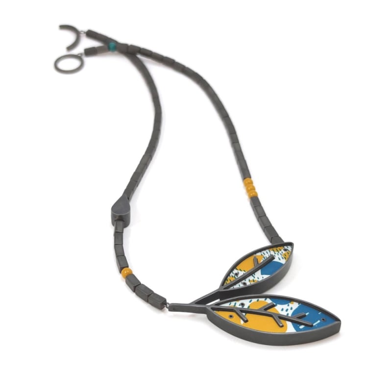 Lindsey Mann Sprig Pendant Necklace (ochre & turquoise), 2021 Anodised aluminium and oxidised silver, hematite, glass. L: 24 cm