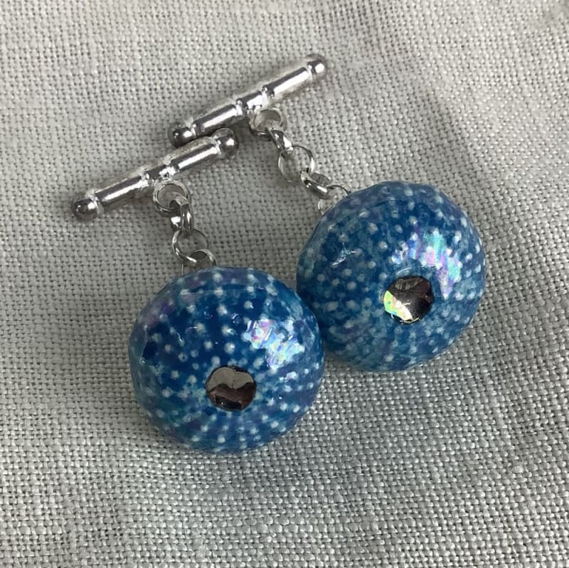 Delfina Emmanuel Sea Urchin Cufflinks - Blue, 2021 Semi porcelain clay, fired 3 - 4 times. Colour stains and oxides, lead glazed. H18 x W18 mm