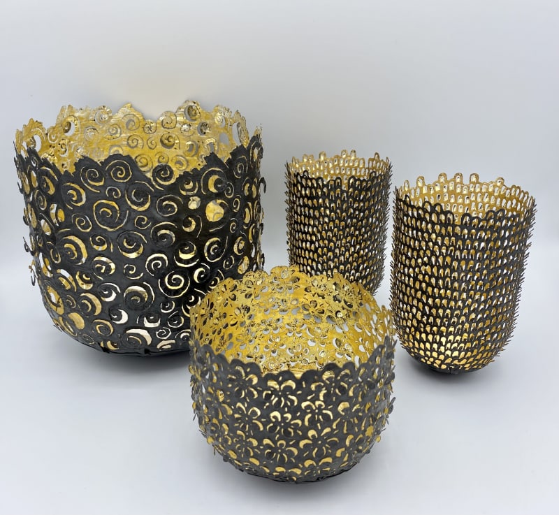 Claire Malet, Ammonite Vessel, 2022 Steel, reformed steel can, 24ct gold, 22ct moon gold, 12ct white gold, Summer Bowl , 2022 Steel, reformed steel can, 24ct gold, 18ct green gold, Teasel Vessel's, 2022. Steel, reformed steel can, 24ct gold.