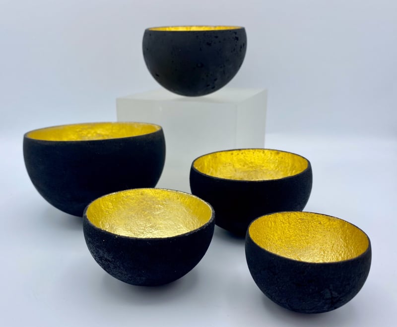 Tracy Nicholls, Glow - Gold, 2023. Glass vessel's with a 22ct gold leaf interior.