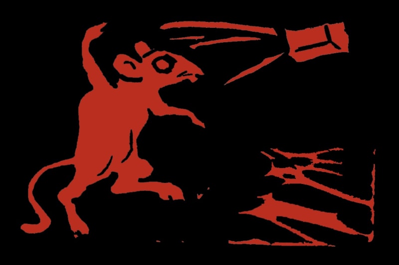 Woodcut stamp in red on black showing ignatz from Krazy Kat throwing a brick