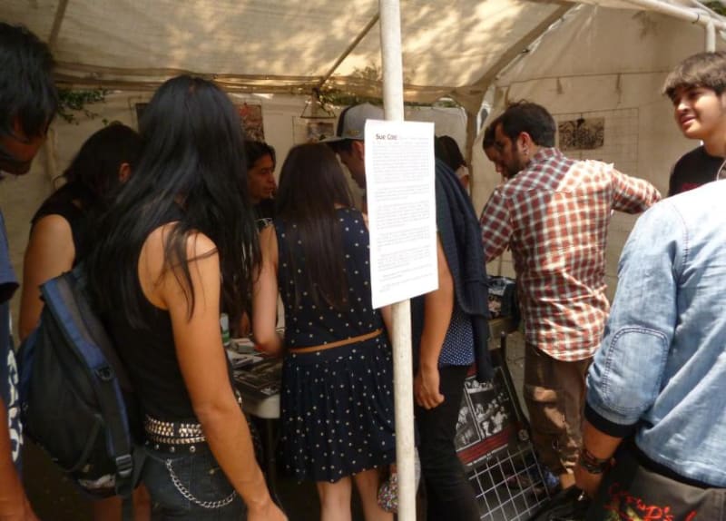 Photograph of a crowd of people stopping by the tent that holds the installation of artworks by the artist at the Tiempo Animal Exhibition, Mexico City, 2018 