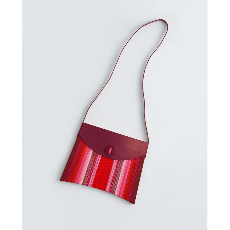 Mette Björnberg, ”On The Move / På väg”, 2024. Painted wood, MDF, pearl yarn, iron, 153x86x4,5 cm