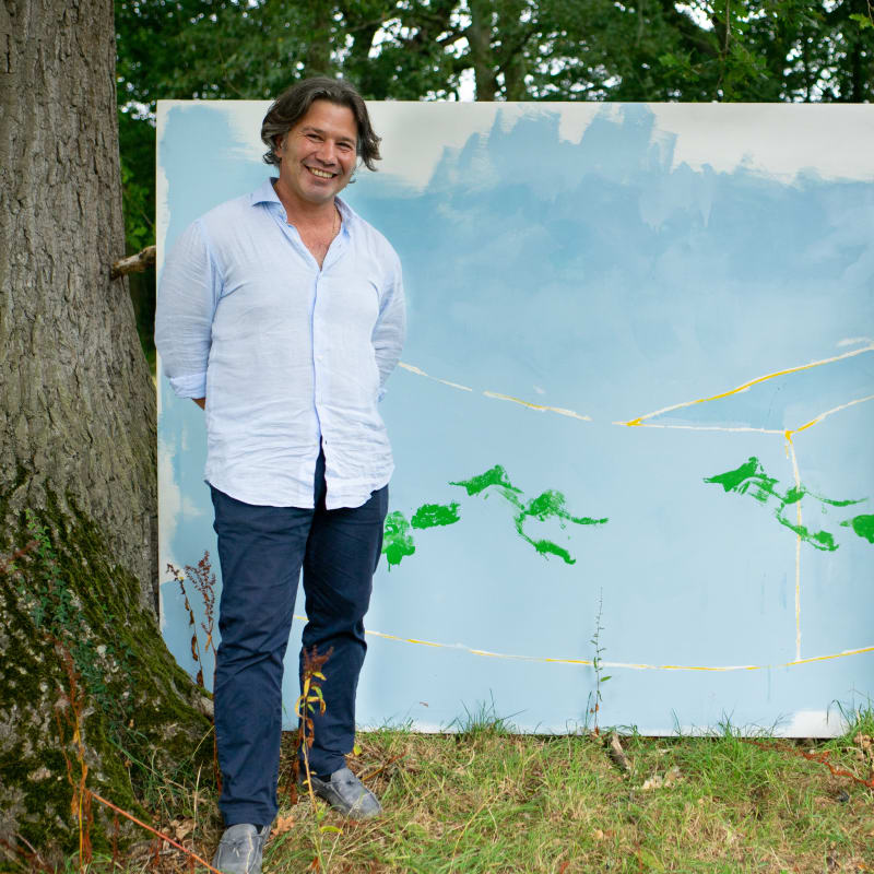Artist Magnus Hammick with his painting 'Yellow Open Cube in Landscape, 2016'