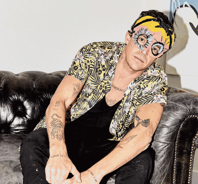 John Paul Fauves on a sofa