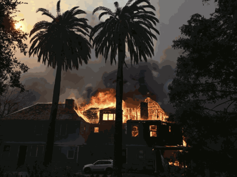 The Andrew McNally House burns during the Eaton Fire in Altadena, California, 2025. Photo ROBYN BECK/AFP via Getty Images