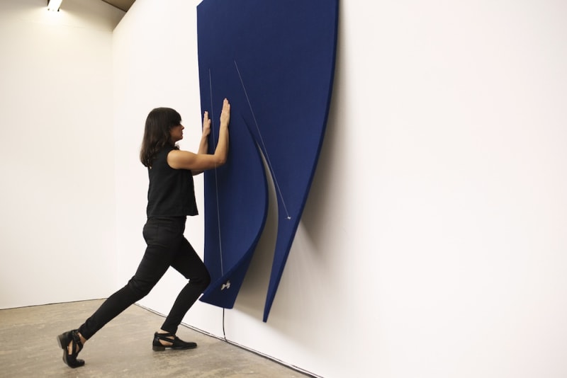 Naama Tsabar, performance on Work On Felt (Variation 10) Midnight Blue, 2016; Transitions #4, performance view, 2018; photo: Serge Hasenböhler; courtesy Kunsthaus Baselland