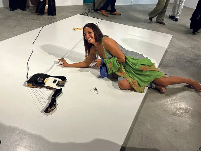 Pulling strings: curator Zoe Lukov demonstrates Naama Tsabar’s installation piece at the Historic Hampton House Museum