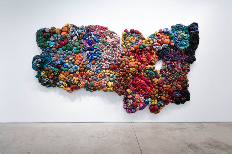 Samuel Nnorom, After the pandemic, 2021, African wax print fabric, 240 × 520 × 30 cm