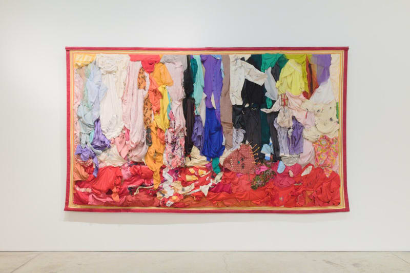 Abodoulaye Konaté Intolerance, 1998 Cotton, textiles, flip flop, bullet shells, notebook and other materials 232,5 × 403,5 × 10 cm