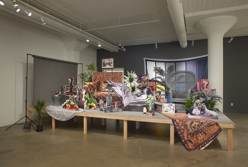 Stephanie Syjuco, "Neutral Calibration Studies (Ornament + Crime)," 2016. Lasercut wood, archival Epson prints, digital fabric prints, live and artificial plants, mixed media. Dimensions variable; exhibition installation: 238 x 98 x 98 inches