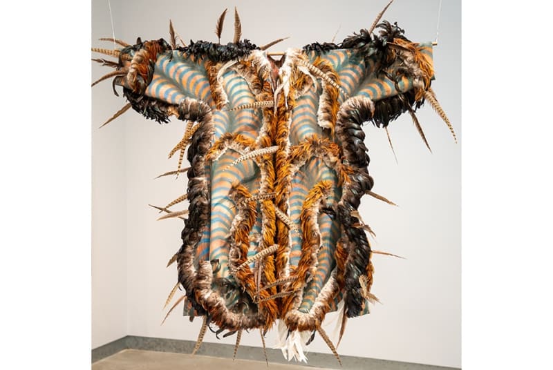 Carlos Villa, Third Coat, 1983. Cloth, canvas, taffeta, acrylic paint, feathers, bones, hair.