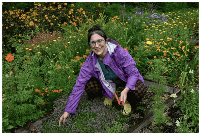 York, ME- 7/31/25- Carly Glovinski poses for a photograph inside of her living art exhibit, the Wild Knoll Foundation Garden on July 31, 2025 in York, Maine. (Heather Diehl for the Boston Globe) Heather Diehl/For The Boston Globe
