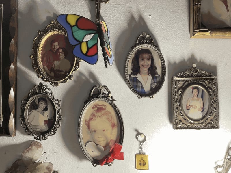 Photos on a family wall in Edra Soto’s childhood home (2020).
