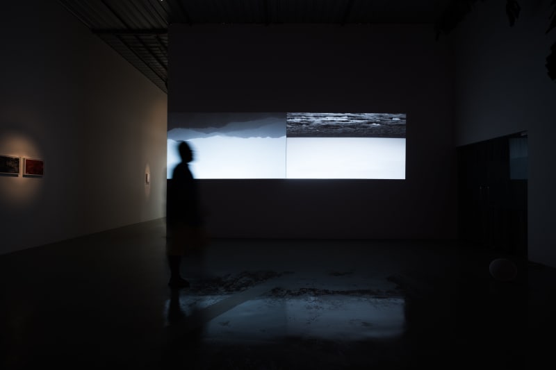 LANDSCAPE AND A MAN WHO EATS THE SUN, Chai Siris.