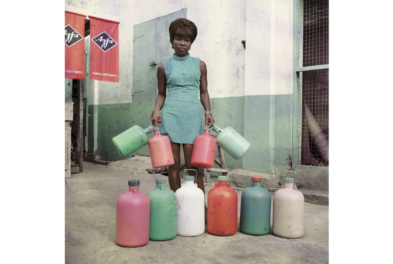 James Barnor Sick-Hagemeyer shop assistant with bottles, taken as a colour guide, Accra, 1971 C-Type print