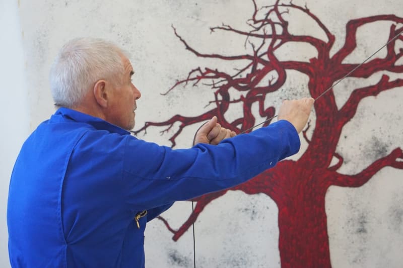 Tony Bevan working in his studio