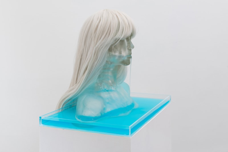 Emily Endo, Water Baby (Fountain), (2018), cast glass, synthetic hair, scented water, dye, acrylic