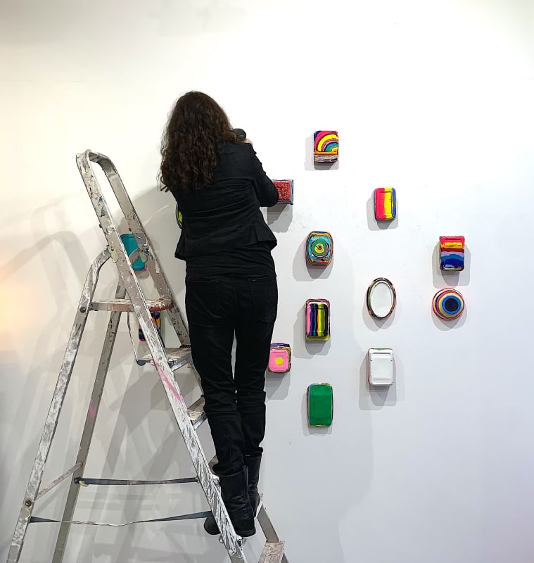 Snoek installing her work in the Gallery