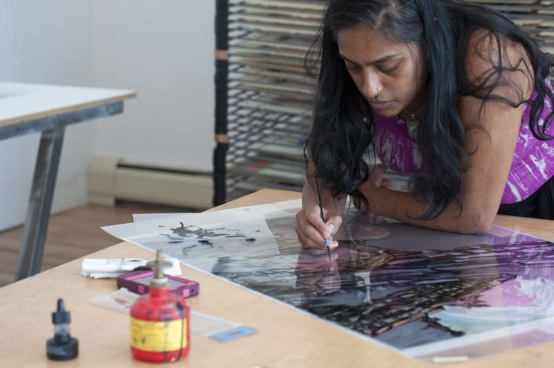 Chitra Ganesh at Durham Press proofing acetates for Architects of the Future portfolio