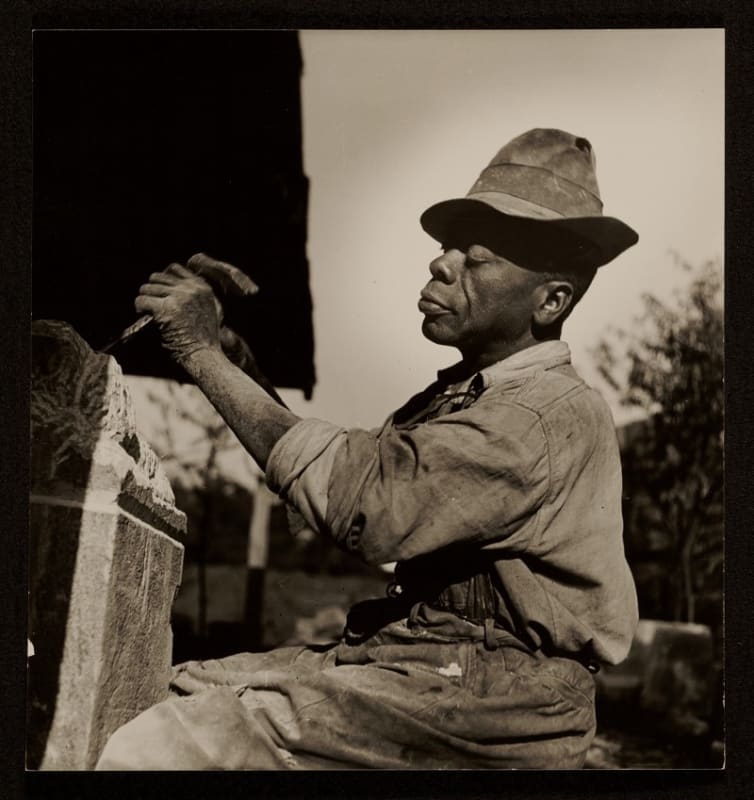 American sculptor William Edmondson working on a sculpture in 1937. Photo by Louise Dahl-Wolfe, courtesy of the Archives of American Art, public domain.