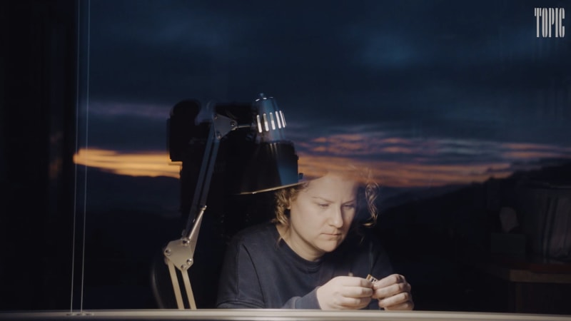 Portrait of artist Abigail Goldman at work in the studio