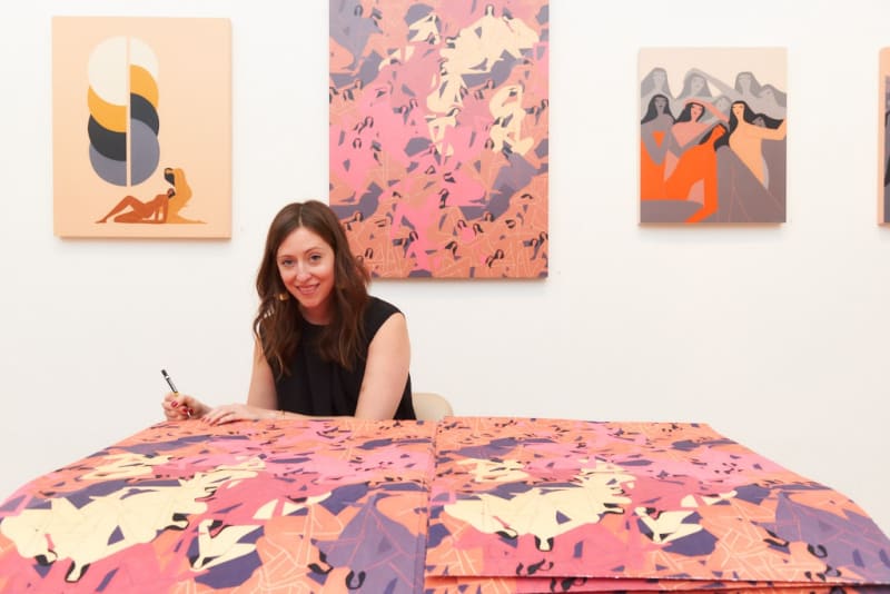 Laura Berger signing prints